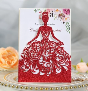 Detail of red glitter laser-cut wedding invitation with elegant female silhouette design