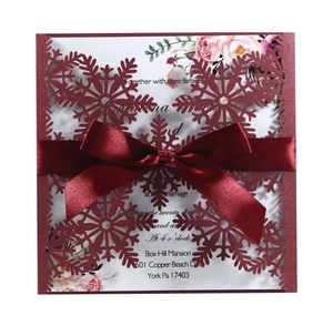 Laser cut burgundy snowflake wedding invitation card with ribbon and floral inner sheet