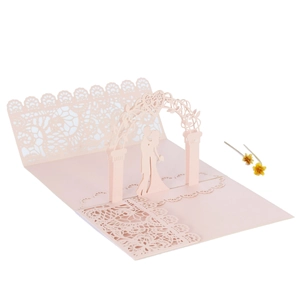 Detailed laser-cut lace pattern on 3D pop-up wedding invitation card in light pink