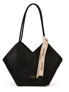 Black tote bag with chevron quilting and beige canvas strap detail on white background