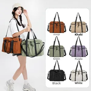 Multi-color large capacity travel tote bag color selection displayed on Asian model