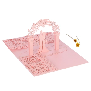 Detail of pink 3D laser-cut wedding card featuring a romantic couple and lace patterns