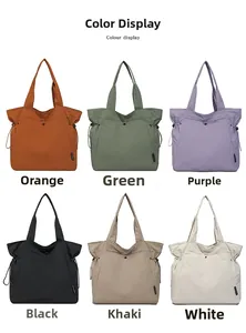 Detail view of large tote bags in six colors with drawstring and magnetic closure