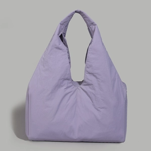Close-up of lavender tote bag showing the micro-wrinkle nylon texture and spacious design