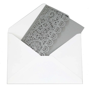 Elegant laser cut lace wedding invitation set with cream white hollow envelope and card