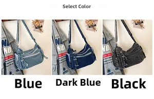 Detailed view of denim crossbody bags in blue, navy, and black with knotted zip pulls