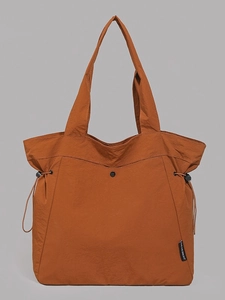 Caramel large capacity nylon tote bag with drawstring details and casual shoulder straps