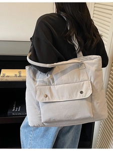 Quilted canvas tote bag with front flap pockets for women, casual crossbody style
