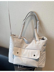 Quilted light gray tote bag with large capacity and padded nylon texture for women