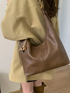 Brown large capacity PU leather hobo shoulder bag with wooden bead tassel and crescent shape