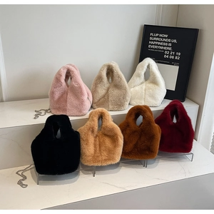 Plush faux fur bucket bag collection with elegant silver metal chains in seven colors