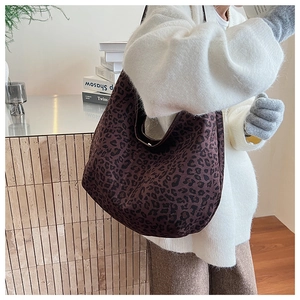 Side view of leopard print tote bag showing thick suede texture and large capacity