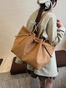 Large caramel suede tote bag with drawstring straps for women commuting and daily wear