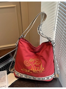 Red canvas tote bag with elephant embroidery and geometric wide strap for women