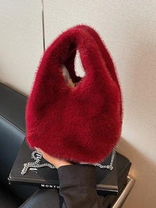 Chic burgundy faux fur bucket bag with silver chain strap for autumn winter fashion