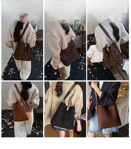 Detailed views of four suede bucket bags with gold twist locks and adjustable straps