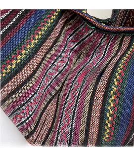 Macro shot of colorful striped woven fabric with detailed bohemian geometric patterns
