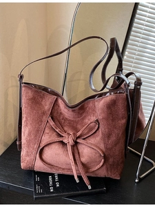 Vintage brown frosted suede tote bag with decorative bow and adjustable strap for women