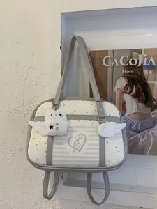 Fashionable white and grey star pattern tote bag with plush owl pendant and wing decor