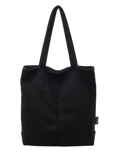 Minimalist black corduroy tote bag with vertical stripes and large capacity design