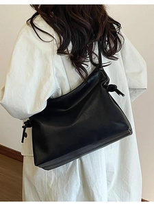 Minimalist black PU leather shoulder bucket bag with knot detail for women commute