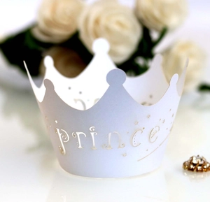 Detailed laser-cut white Prince crown cupcake wrapper with hollow stars and dots