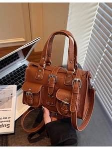 Vintage brown lychee texture tote bag with buckle pockets and adjustable shoulder strap