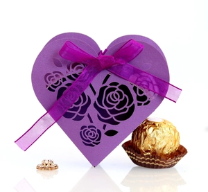 Purple heart-shaped gift box with laser-cut rose patterns and silk ribbon for weddings