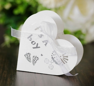 Heart-shaped white hollow paper candy box with It's a Boy text and white ribbon