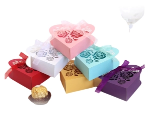 Hollow heart-shaped rose gift boxes in various colors with ribbon bows for weddings