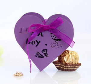Purple heart-shaped 'It's a boy' candy box with stroller cutouts and silk bow
