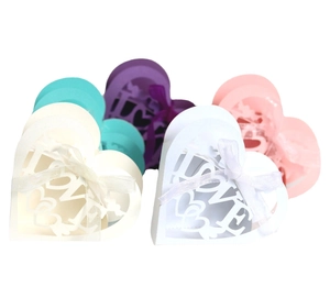 Laser cut heart shaped wedding favor boxes with LOVE pattern and matching ribbon