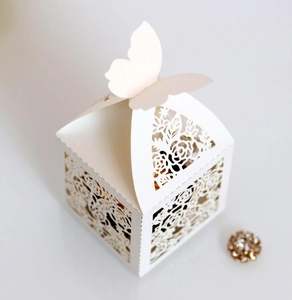 Elegant white laser-cut rose candy box with a 3D butterfly lid for wedding party favors