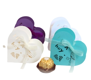 Hollow heart-shaped baby shower candy boxes with silk ribbon and Boy footprints print