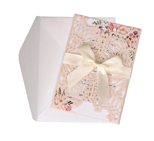 Laser cut light pink wedding invitation set with silk bow and floral insert card