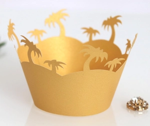 Golden laser cut palm tree cupcake liners with metallic paper finish for party decor
