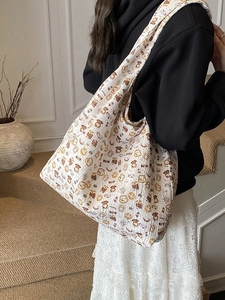 Large cream canvas tote bag with cute cartoon bear prints for daily casual use