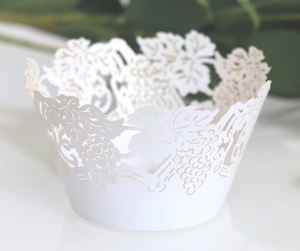Elegant laser cut cupcake wrappers with white grape vine patterns for party dessert decoration
