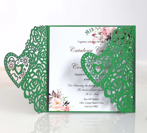 Laser-cut heart and floral wedding invitation with green hollow sleeve and pink roses