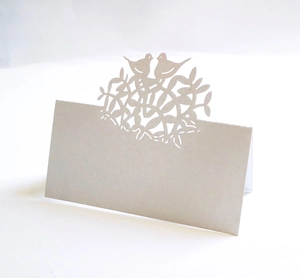 Laser cut tree of life place card with birds for wedding table decoration in off-white