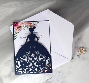 Detailed laser-cut dark blue princess gown invitation with pink floral inner card