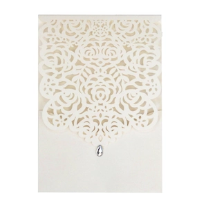 Intricate laser-cut floral pattern with rhinestone on ivory wedding invitation cover