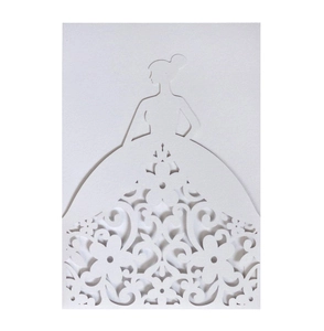 Detailed view of laser-cut floral ballgown silhouette on white wedding invitation card