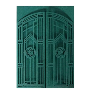 Detail of laser-cut rose floral pattern on dark green hollow engagement invitation card