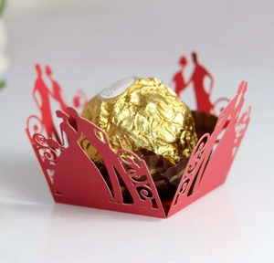 Laser-cut red wedding chocolate holder featuring romantic couple silhouette design