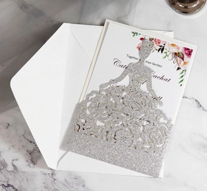 Detail of silver glitter laser-cut princess dress wedding card with floral inner sheet