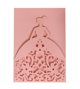 Pink laser-cut wedding invitation featuring an elegant dress silhouette with floral patterns