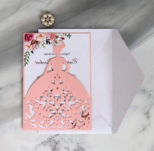Detail showing pink laser-cut bridal silhouette invitation with floral inner card and envelope