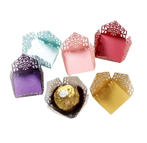 Laser cut hollow paper chocolate liners set in assorted pearlescent colors for weddings