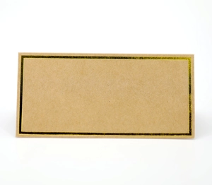 Close-up of a natural brown kraft paper place card with an elegant double gold foil border